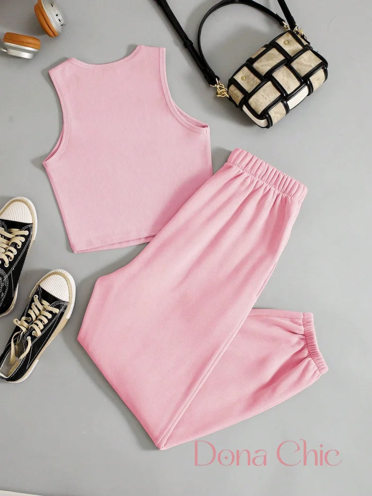 Conjunto Cropped Com Detalhe Em Estampa E Calça Jogger Conjunto Cropped Com Detalhe Em Estampa E Calça Jogger