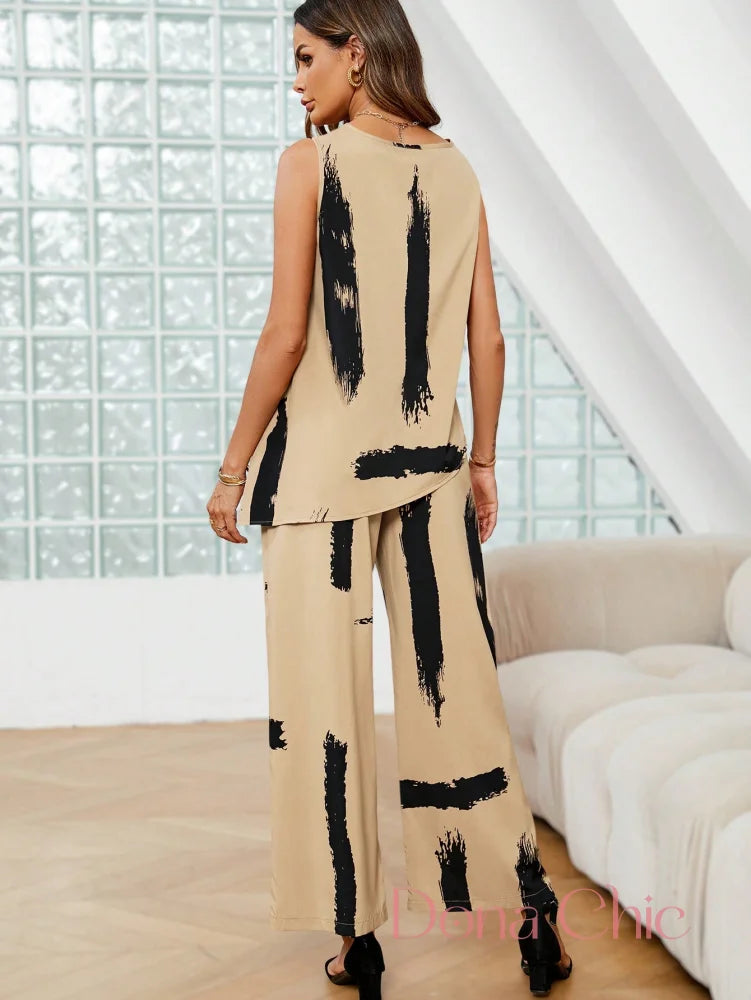 Conjunto Estampado Abstrato Com Blusa Assimétrica E Calça Conjunto Estampado Abstrato Com Blusa Assimétrica E Calça