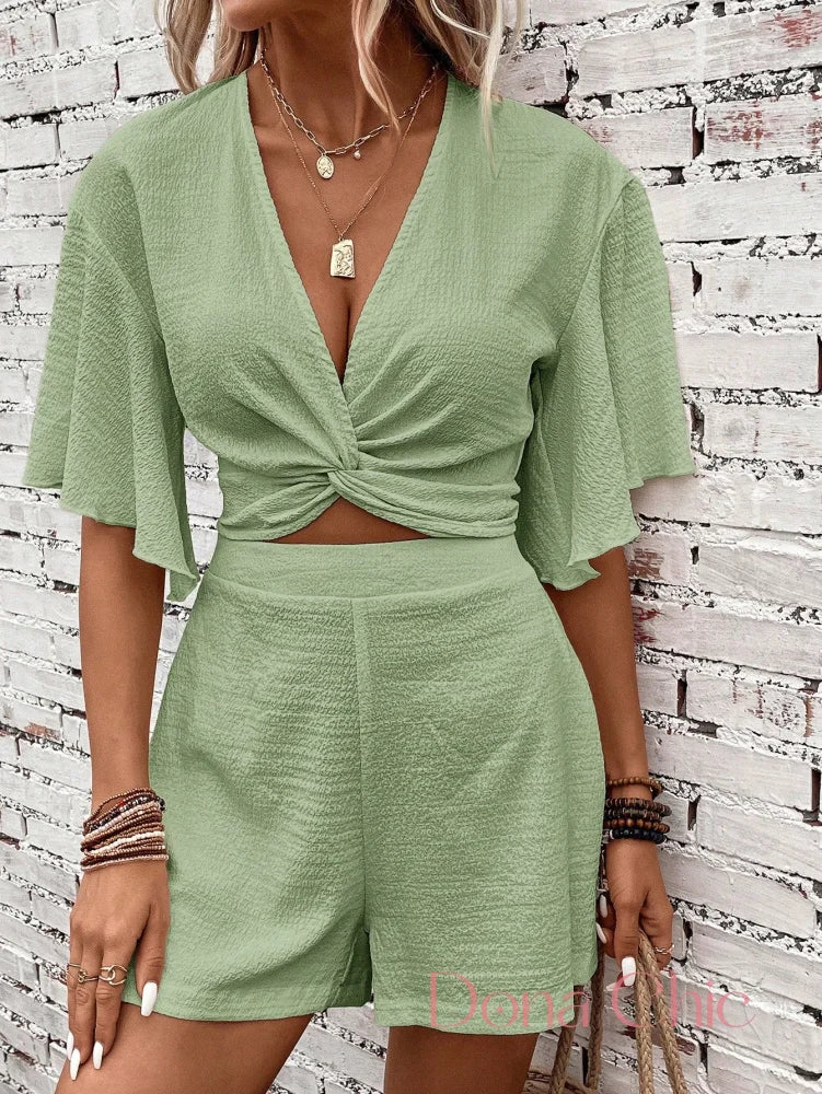 Conjunto Manga Flare Com Amarração Frontal E Short Solto Conjunto Manga Flare Com Amarração Frontal E Short Solto