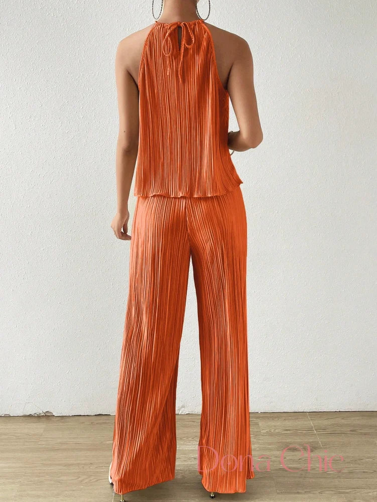 Conjunto Plissado Com Blusa Halter E Calça Ampla Conjunto Plissado Com Blusa Halter E Calça Ampla