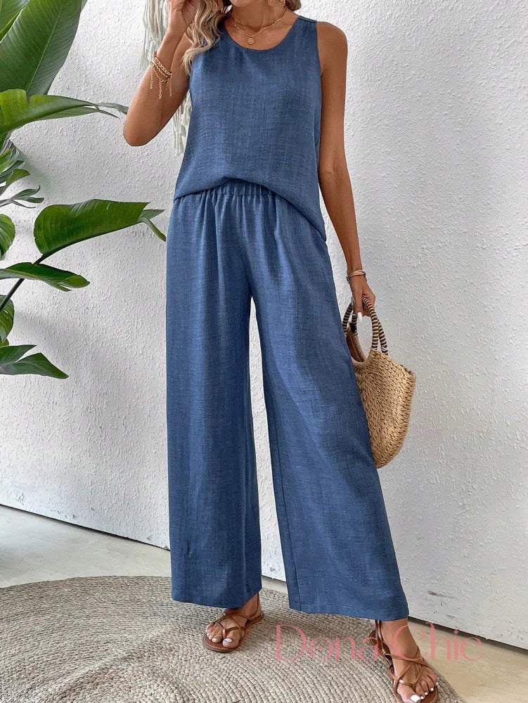 Conjunto Regata Com Detalhe Vazado E Calça Pantalona Conjunto Regata Com Detalhe Vazado E Calça Pantalona