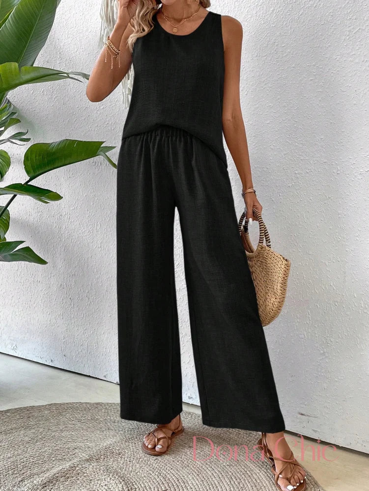 Conjunto Regata Com Detalhe Vazado E Calça Pantalona Conjunto Regata Com Detalhe Vazado E Calça Pantalona