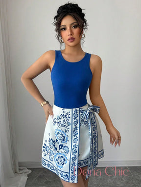 Conjunto Body Com Saia Estampada E Laço Lateral Conjunto Body Com Saia Estampada E Laço Lateral