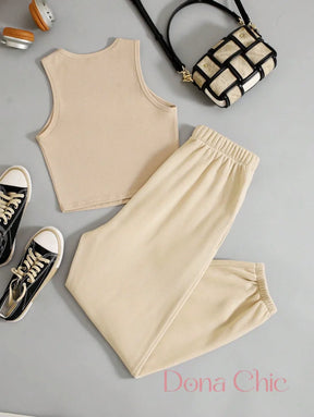 Conjunto Cropped Com Detalhe Em Estampa E Calça Jogger Conjunto Cropped Com Detalhe Em Estampa E Calça Jogger