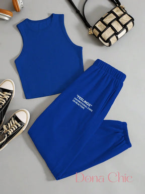 Conjunto Cropped Com Detalhe Em Estampa E Calça Jogger Conjunto Cropped Com Detalhe Em Estampa E Calça Jogger