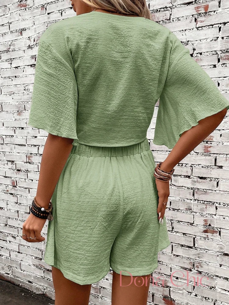Conjunto Manga Flare Com Amarração Frontal E Short Solto Conjunto Manga Flare Com Amarração Frontal E Short Solto