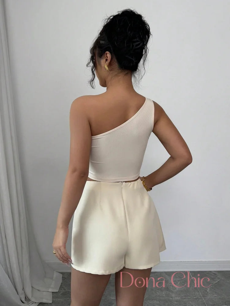 Conjunto Top Assimétrico Com Saia Com Laço Lateral Conjunto Top Assimétrico Com Saia Com Laço Lateral