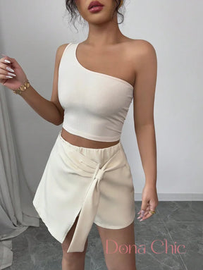 Conjunto Top Assimétrico Com Saia Com Laço Lateral Conjunto Top Assimétrico Com Saia Com Laço Lateral